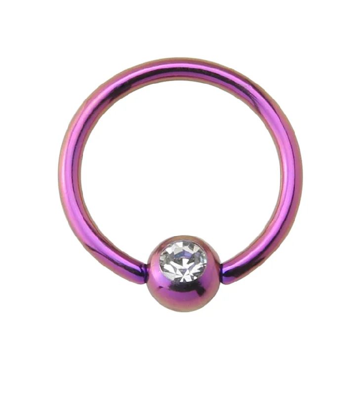 Women's travel rings-Purple PVD Clear CZ Captive Ring