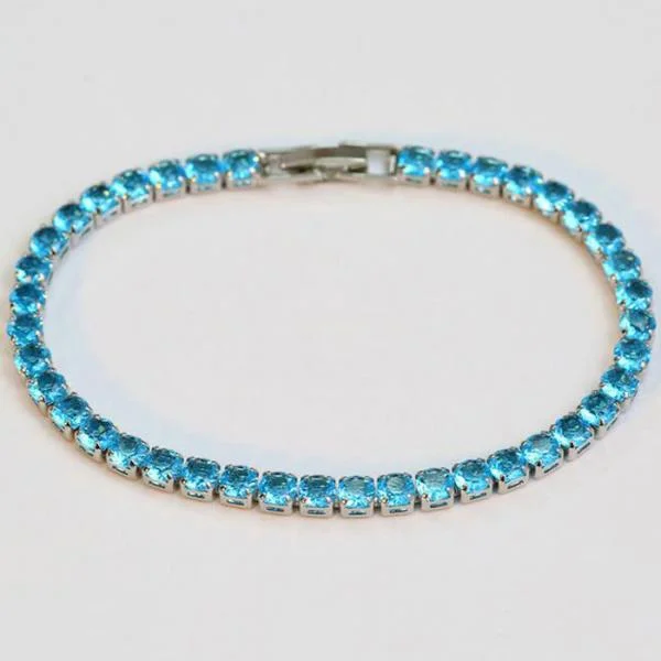 Women's gift bangles-Sterling Silver Blue Aquamarine Oval Cut Petite Tennis Bracelet