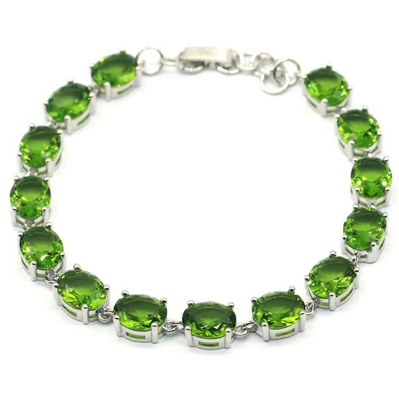 Women's beaded bangles-Sterling Silver Oval Cut Green Peridot Tennis Bracelet