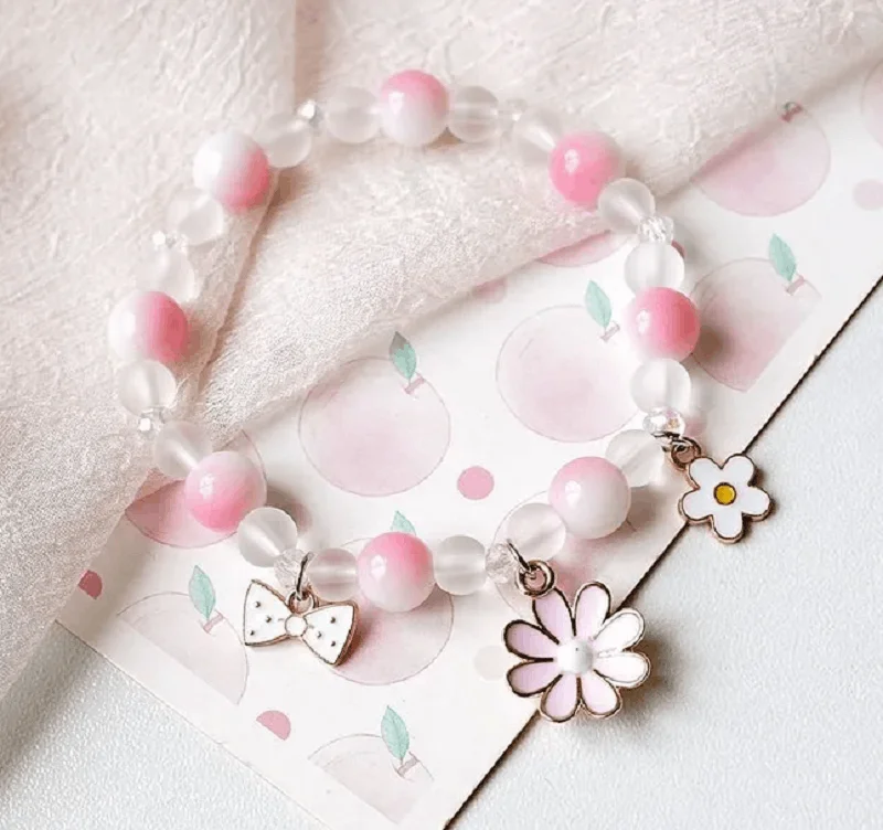 Women's cross bangles-Children's 'Pink and White Flowers' Stretch Bead Bracelet