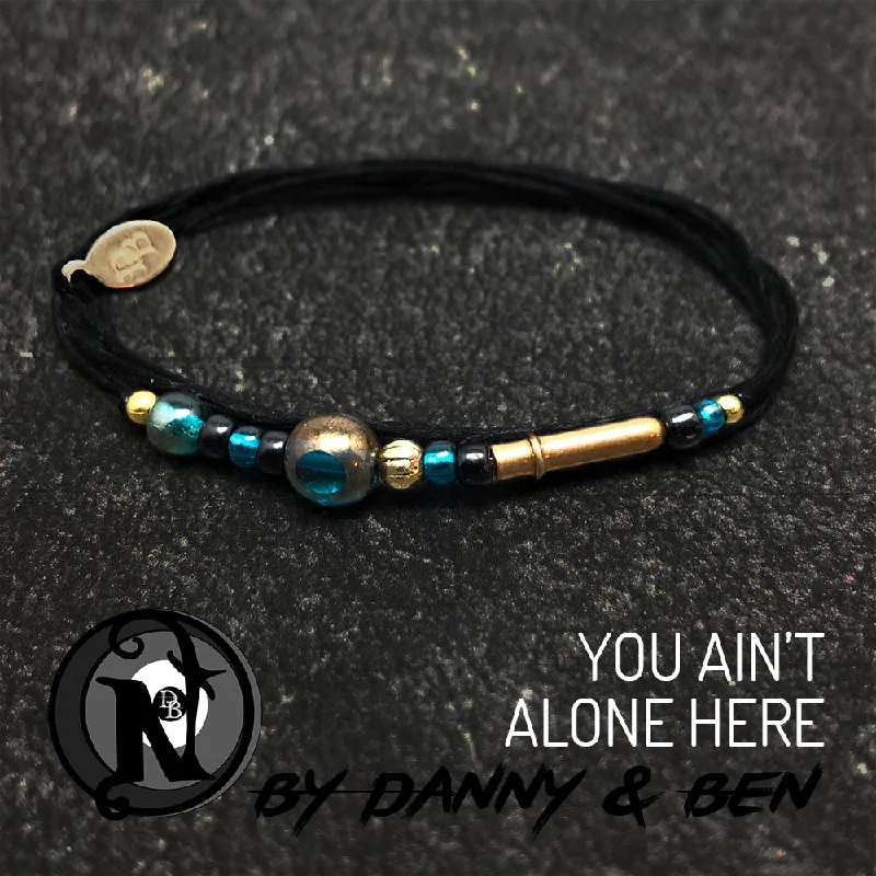 Women's ruby bangles-You Ain't Alone Here Daylight NTIO Bracelet by Danny Worsnop & Ben Bruce